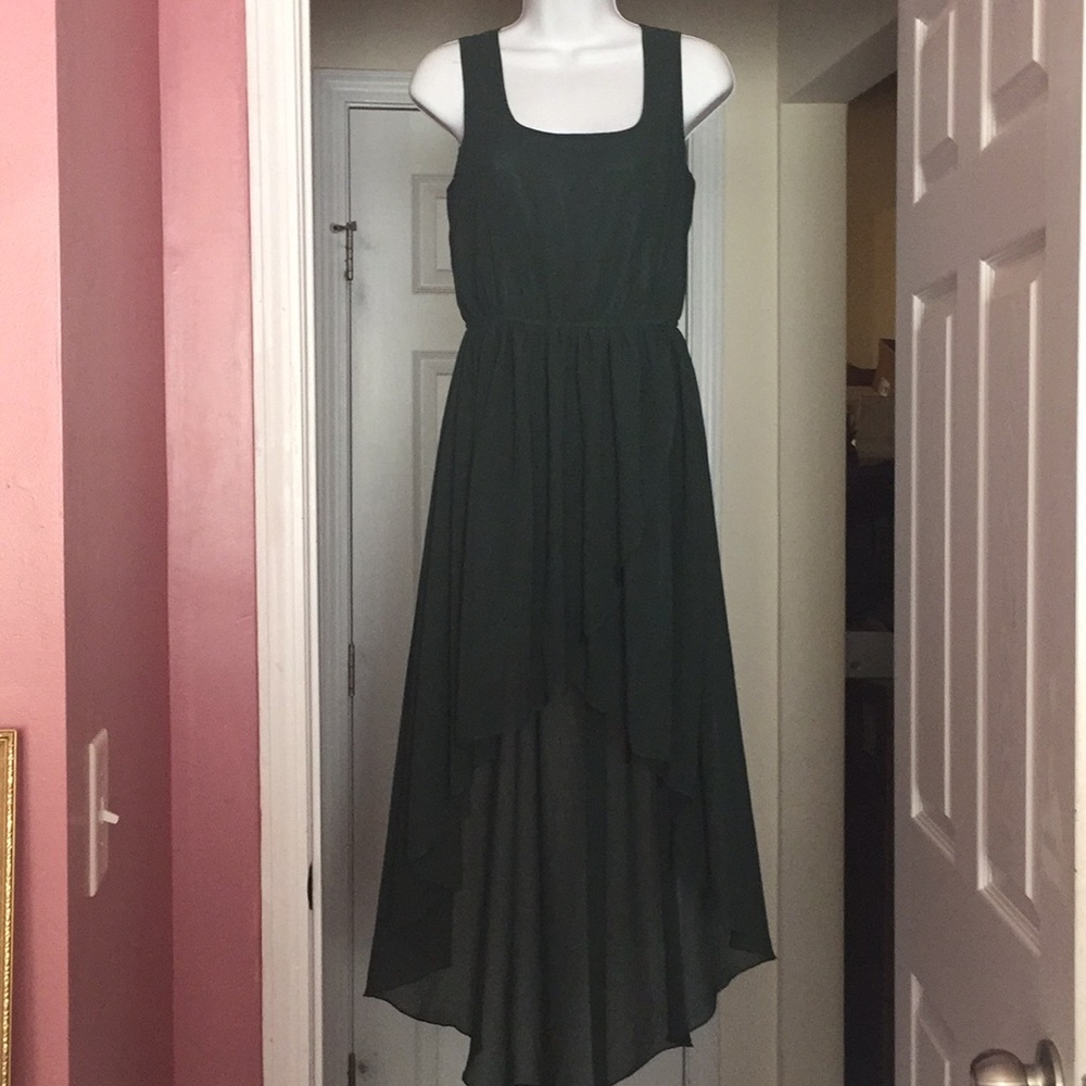 It is an emerald colored high low dress